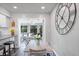 Bright and modern kitchen with stainless steel appliances overlooking the comfortable living room at 2887 Cathy Ln, Clearwater, FL 33760