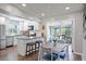 Modern eat in kitchen with stainless steel appliances and stylish breakfast bar at 2887 Cathy Ln, Clearwater, FL 33760