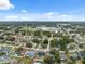 Expansive aerial shot featuring a residential area and showcasing a school in the distance at 3312 Blythe Ave, Spring Hill, FL 34609