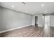 Spacious bedroom with vinyl plank flooring, neutral paint and closet at 3312 Blythe Ave, Spring Hill, FL 34609