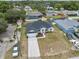 Inviting one-story home featuring a spacious driveway and lush surroundings in a vibrant neighborhood at 3312 Blythe Ave, Spring Hill, FL 34609