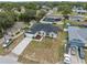 Charming single-story home featuring a well-manicured lawn and a long driveway for ample parking at 3312 Blythe Ave, Spring Hill, FL 34609