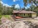 Beautiful single-story home with a well maintained lawn and attached one car garage at 34335 Berryhill Dr, Webster, FL 33597