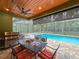 Outdoor pool and patio with grill and outdoor seating at 34335 Berryhill Dr, Webster, FL 33597