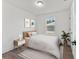 Charming bedroom featuring neutral tones, natural light, and modern decor at 3554 Arrowhead Ave, Spring Hill, FL 34606