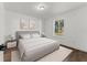 Serene bedroom showcasing neutral tones, natural light, and modern decor at 3554 Arrowhead Ave, Spring Hill, FL 34606