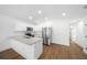 Contemporary kitchen featuring stainless steel appliances, granite countertops, and ample lighting at 3554 Arrowhead Ave, Spring Hill, FL 34606