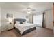 Comfortable main bedroom with a plush bed, soft lighting, and serene decor creating a restful environment at 3900 Autumn Amber Dr, Spring Hill, FL 34609