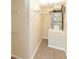A closet containing an air conditioner and storage shelving within a home at 4008 Passport Ln # 104, New Port Richey, FL 34653