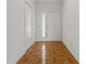 Bright foyer with decorative tile flooring and a closet for storage at 4125 Mc Clung Dr, New Port Richey, FL 34653