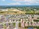 An aerial view of a neighborhood showcases the proximity to local amenities and well-maintained streets at 4266 High Ridge Ave, Spring Hill, FL 34609