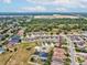 Aerial view of a home in a residential community with nearby green space and convenient location at 4266 High Ridge Ave, Spring Hill, FL 34609