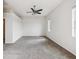 Spacious bedroom featuring neutral walls, carpet floors and natural light at 4266 High Ridge Ave, Spring Hill, FL 34609