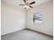 Cozy bedroom featuring neutral carpet and a window at 4266 High Ridge Ave, Spring Hill, FL 34609