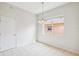 Light filled dining room with neutral tile flooring and bright chandelier at 4266 High Ridge Ave, Spring Hill, FL 34609