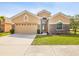 A charming single-Gathering home boasting a well-manicured lawn and a spacious two-car garage at 4266 High Ridge Ave, Spring Hill, FL 34609