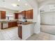 Spacious kitchen with wood cabinets and stainless steel appliances at 4266 High Ridge Ave, Spring Hill, FL 34609