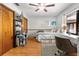 Cozy bedroom with a work area, closet, and hardwood floors at 4289 Castle Ave, Spring Hill, FL 34609