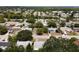 Wide aerial shot showing the neighborhood, with tree-lined streets at 4388 Craftsbury Dr, New Port Richey, FL 34652