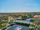Aerial shot showcasing a scenic bridge crossing over water, surrounded by lush trees at 4388 Craftsbury Dr, New Port Richey, FL 34652