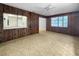 Spacious room featuring carpet and a window into the next room at 4388 Craftsbury Dr, New Port Richey, FL 34652