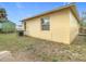 Exterior of the house and backyard showing the AC unit at 4503 Courtland St, Tampa, FL 33610