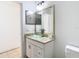 Bathroom vanity with granite countertop and glass bowl sink at 4503 Courtland St, Tampa, FL 33610
