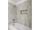 Bathroom with tiled shower and bathtub at 4503 Courtland St, Tampa, FL 33610