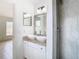 Bathroom featuring double sinks and granite countertop at 4503 Courtland St, Tampa, FL 33610