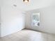 Bedroom with tile flooring and a window at 4503 Courtland St, Tampa, FL 33610