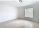 Bright bedroom with tiled floors and a window providing natural light at 4503 Courtland St, Tampa, FL 33610