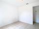 Bedroom with tile floor and entry door at 4503 Courtland St, Tampa, FL 33610