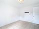 Bedroom with a tile floor and entry door at 4503 Courtland St, Tampa, FL 33610
