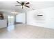 Open-concept living area with a combined kitchen and dining space, creating a bright and inviting atmosphere at 4503 Courtland St, Tampa, FL 33610