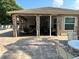 Clubhouse with brick columns, tables, and chairs available for community use at 4557 Glen Holw, New Port Richey, FL 34653
