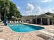 Inviting community pool and clubhouse, perfect for outdoor relaxation and recreation at 4557 Glen Holw, New Port Richey, FL 34653