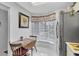 Bright kitchen featuring stainless steel appliances, eat in space, and ample natural light from nearby window at 4557 Glen Holw, New Port Richey, FL 34653