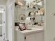 Bar area with mirrored shelving perfect for displaying pictures and decorative items at 4841 Wakefield Ct # 4841, New Port Richey, FL 34655