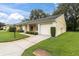 This charming home features an attached garage and well-manicured lawn, set back from the street at 4841 Wakefield Ct # 4841, New Port Richey, FL 34655
