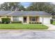 Charming single-story home featuring a well-maintained lawn, bay window and attached garage at 4841 Wakefield Ct # 4841, New Port Richey, FL 34655