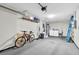 Ample two car garage featuring a laundry area, overhead storage and space for organization at 4841 Wakefield Ct # 4841, New Port Richey, FL 34655
