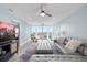 Bright living room with marina views, stylish furnishings, and light wood floors at 4939 Floramar Ter # 611, New Port Richey, FL 34652