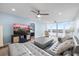 Inviting living room with lots of natural light and access to a bedroom with an ensuite bathroom at 4939 Floramar Ter # 611, New Port Richey, FL 34652
