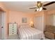 Cozy bedroom with a ceiling fan and a closet at 5123 Topaz Ln # 206, New Port Richey, FL 34652