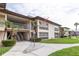 Charming condo with well-maintained landscaping and a welcoming entryway at 5123 Topaz Ln # 206, New Port Richey, FL 34652