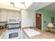 Cozy kitchen features an oven, microwave, and a stainless steel sink at 5123 Topaz Ln # 206, New Port Richey, FL 34652