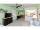 Cozy living room flowing into a well-lit kitchen, creating an inviting living space at 5123 Topaz Ln # 206, New Port Richey, FL 34652