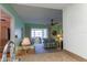 Bright living room with comfortable seating, a ceiling fan, and lots of natural light at 5123 Topaz Ln # 206, New Port Richey, FL 34652