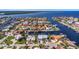 Aerial view showcasing the neighborhood's waterfront access and stunning location on the water at 5145 Porpoise Pl, New Port Richey, FL 34652