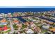 This aerial view showcases the unique waterfront community, with canals and beautiful views of the area at 5145 Porpoise Pl, New Port Richey, FL 34652